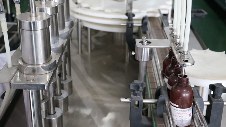 წარმოება 5 გალონის შემავსებელი დანადგარის ცხელი ცვილის შემავსებელი მანქანის საცხი წყლის შემავსებელი დალუქვის მანქანა